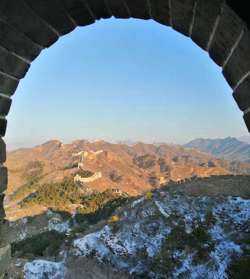 Panoramic view of the Great Wall winding through mountains