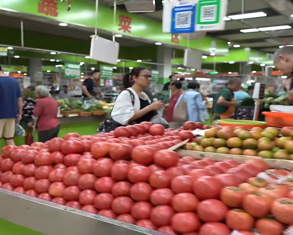 Fresh spices and seasonal ingredients at Beijing morning market for cooking class