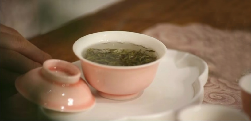 Close-up detail of a traditional Chinese tea ceremony brewing process